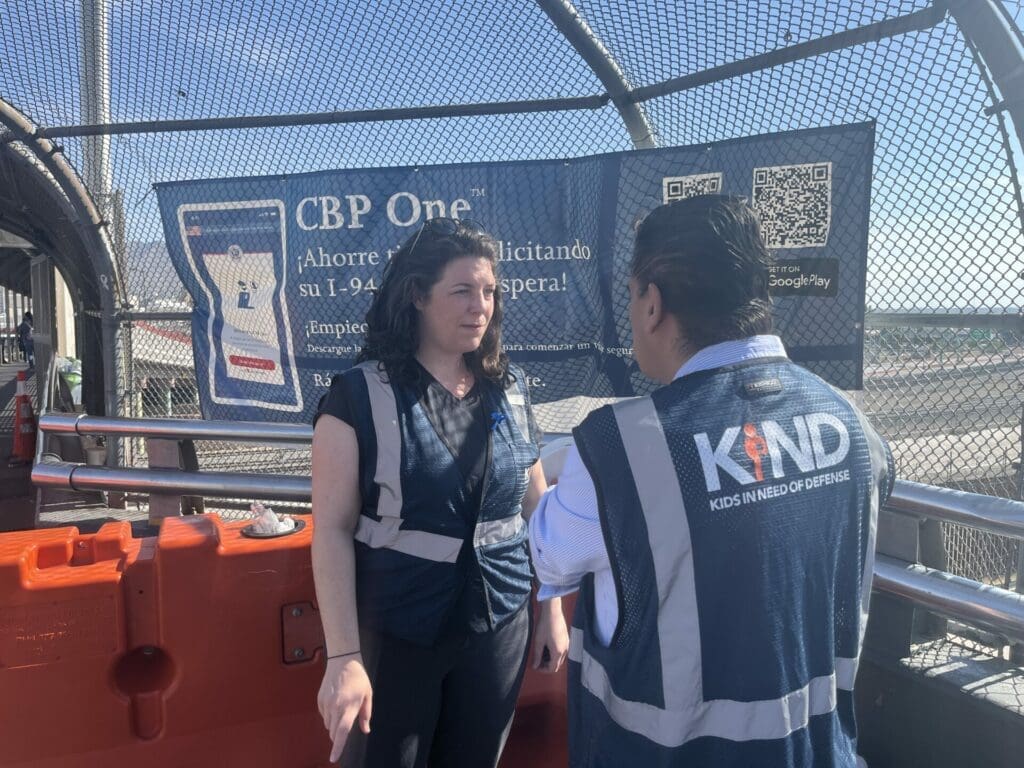 KIND staff at the U.S.-Mexico border on the bridge.