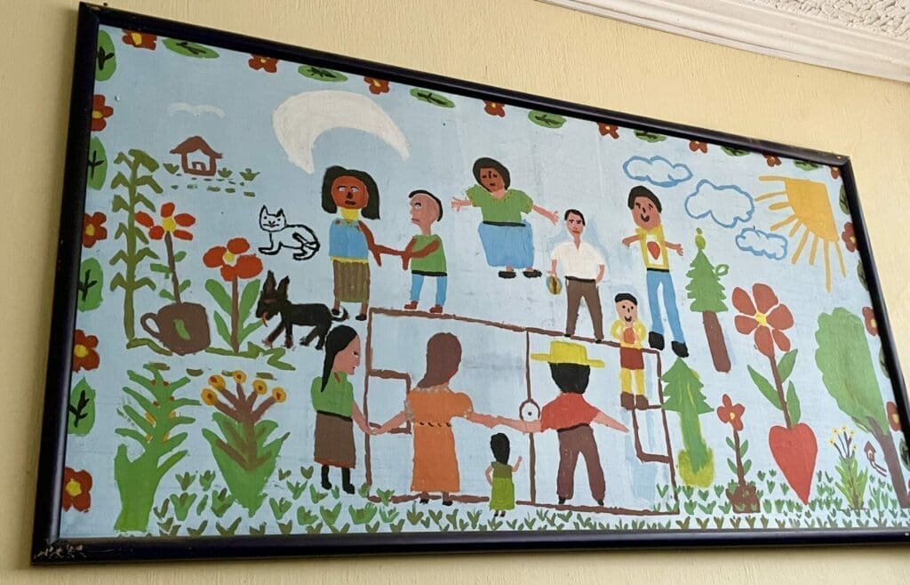 Mural of children and families together in a circle