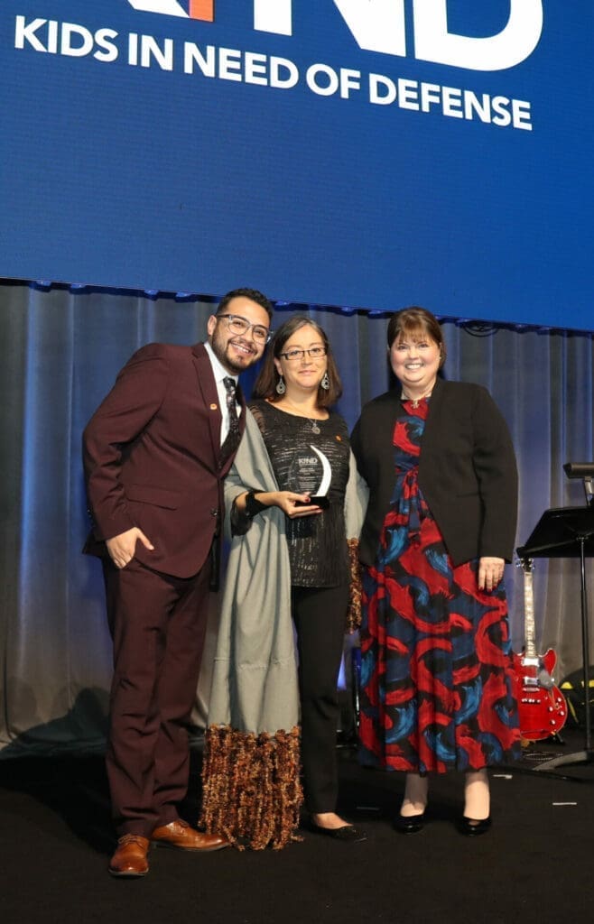 Photo from KIND's Gala of President Wendy Young (right), Elba Coria Marquez (center), and Enrique Chavira Cantu (left)