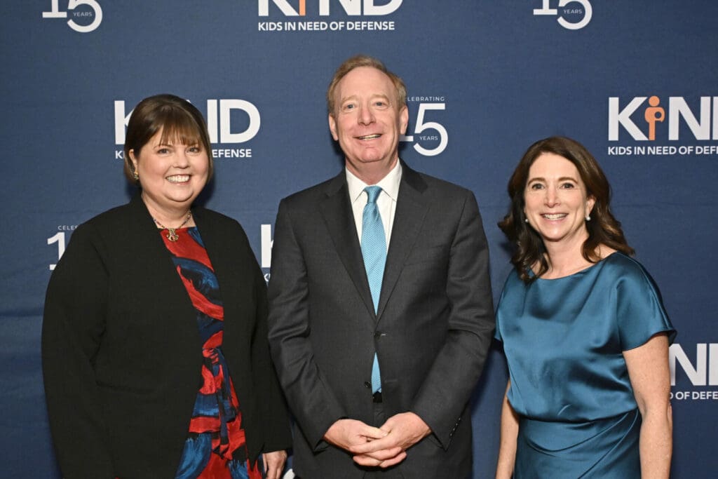 Wendy Young, Brad Smith, and Pamela Passman attend the Kids in Need of Defense 2023 Gala